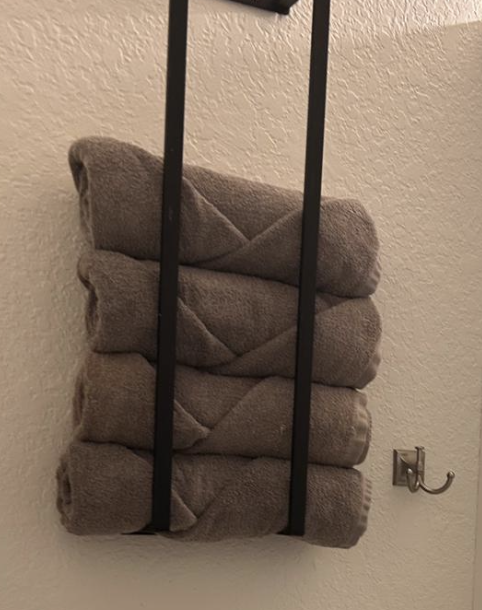 Towels carefully folded and presented for Airbnb guests